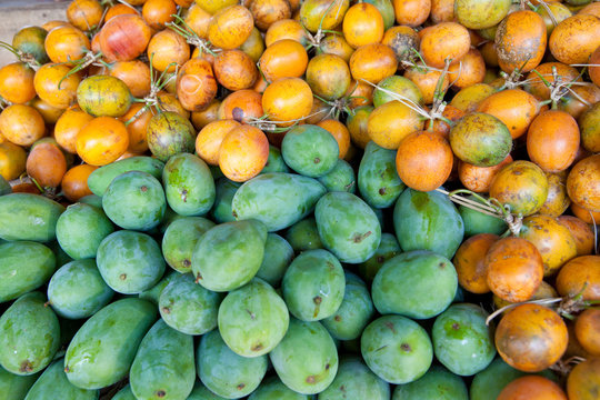 Many fruits passion fruit and mango.