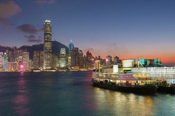 Victoria Harbor of Hong Kong city under sunset