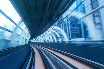 Motion blur of train moving inside tunnel