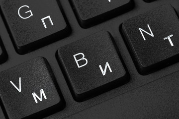 Black laptop keyboard close up