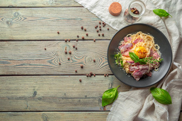 Pasta Carbonara. Spaghetti with bacon, parsel and parmesan cheese
