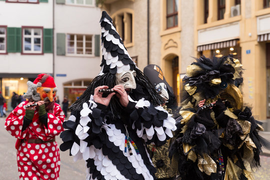 Basel carnival. Nadelberg, Basel, Switzerland - February 21st, 2018. Close-up of a beautiful black and white clown costume