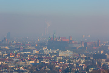 Dense smog over the city, aerial view of Krakow, Poland