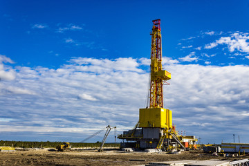 Drilling rig in summer construction site