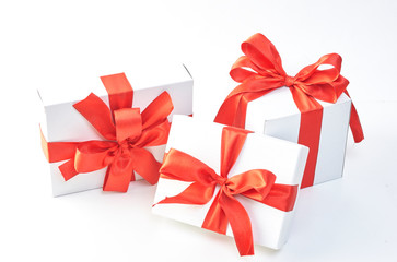Gift box with red ribbon