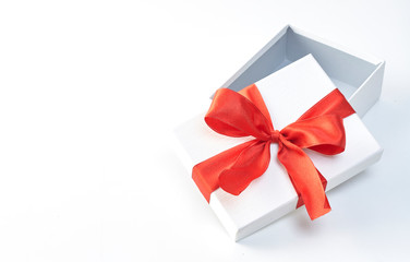 Gift box with red ribbon