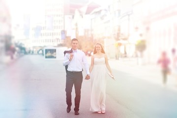 Romantic wedding of bride and groom celebrating marriage in the autumn in city.