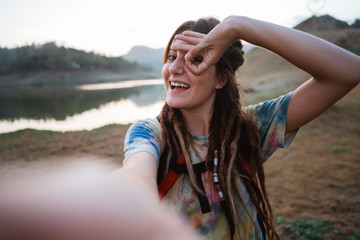 caucasian woman selfie in the morning sunrise