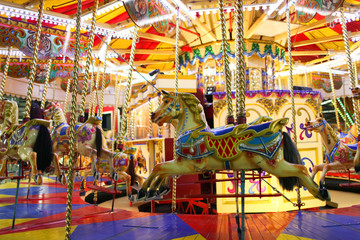 Fototapeta na wymiar Merry go round / carousel. Horses