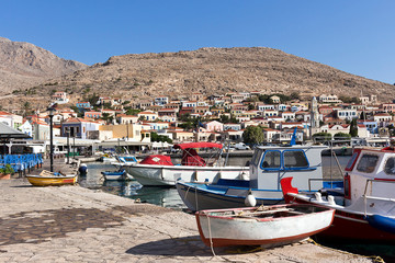 Fototapeta na wymiar Halki, Emporio village harbour, Aegean sea, Dodecanese Islands, Greece 