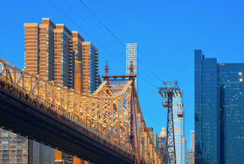 queensboro bridge blue sky and roosevelt island tramway in Manhattan, New York