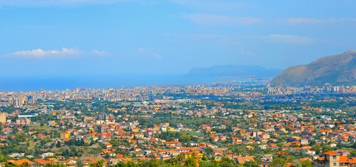 Aerial view and landscape of Palermo and mediterranean sea in background from Monreale. Sicily. Italy.