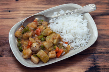 squid stew with boiled rice on dish