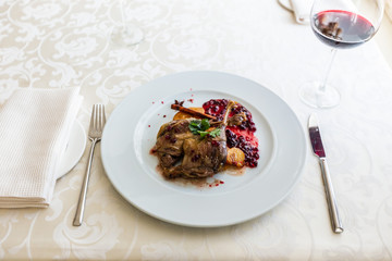 Duck leg confit with mountain cranberries sauce and pear chutney