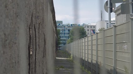 Sector of the Berlin wall with protruding fittings.