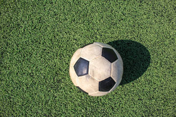 Football on artificial turf. It is for green background in a stadium