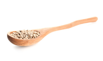 Wooden spoon with pepper on white background
