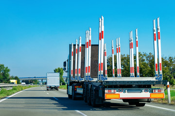 Fototapeta na wymiar Truck without trailer box at asphalt highway road in Poland