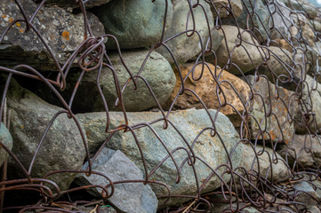 gabion wall made up of boulders and steel mesh