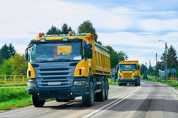 Trucks at asphalt road in Poland