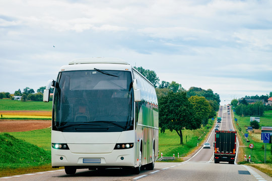 White Tourist bus on road Poland