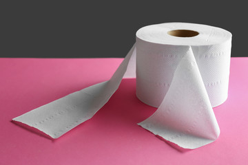 Roll of toilet paper on table