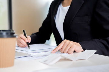 Administrator business man financial inspector and secretary making report calculating balance. Internal Revenue Service checking document. Audit concept