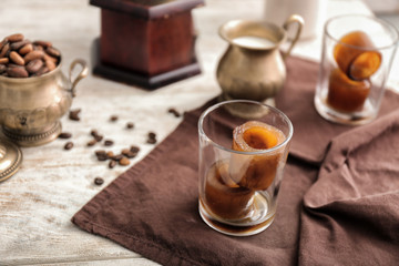 Composition with coffee ice on table