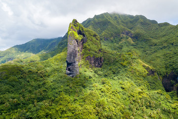 Rock with the shape of a Giant Tiki head on Raiatea island. Raiatea, Leeward Islands, Society Islands, French Polynesia, Oceania, South Pacific Ocean