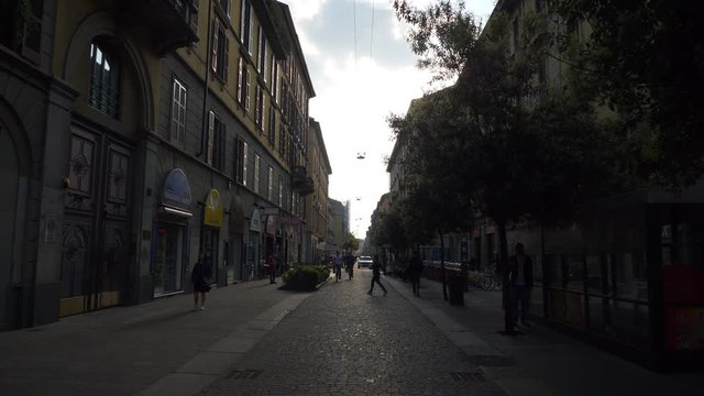 sunny evening milan city famous pedestrian street slow motion panorama 4k italy

