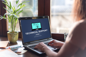 Technical support concept on a laptop screen - obrazy, fototapety, plakaty