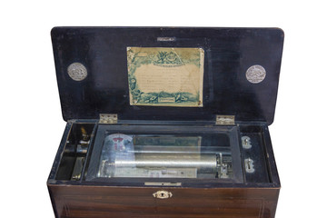 Old-time music box in a black wooden box for 6 tunes.