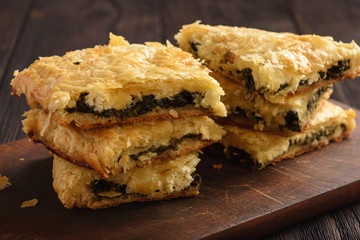 Homemade savory pie  with spinach and feta cheese.