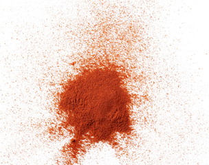 Pile of red pepper, paprika powder isolated on white background