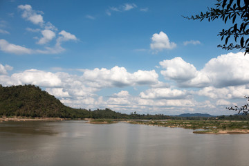 Clouds over river in mid day concept design to natural background