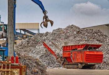 Recycling scrap metal at a waste management facility
