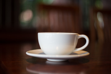 Coffee cup on blur background.