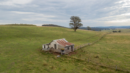 abandoned house on the hill aerial photo