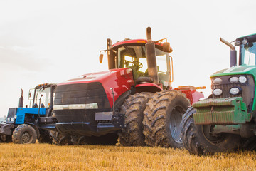 Photo of the big tractors in the field