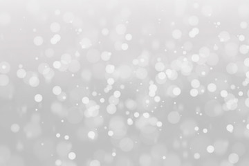 Fototapeta na wymiar white snow background, bokeh white background, glitter white background, silver snowy background, silver bokeh wallpaper