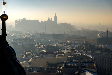 Fototapeta Aerial view of the south part of the Krakow with Wawel castle and Royal Archcathedral Basilica of Saints Stanislaus and Wenceslaus.View from St. Mary's Cathedral. Poland. 10-12-2015 obraz
