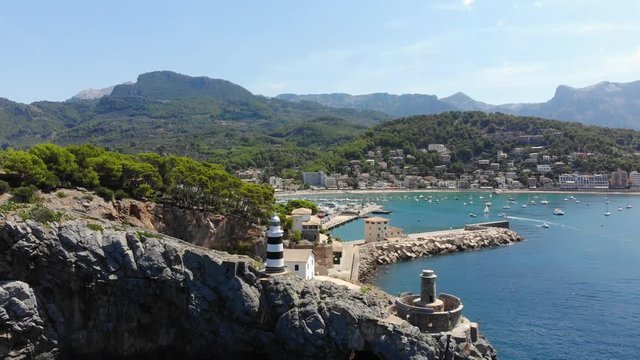 Flight over the bay of Port de Soller in Mallorca Tramuntana Mountains