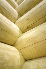 Wooden log home walls corner