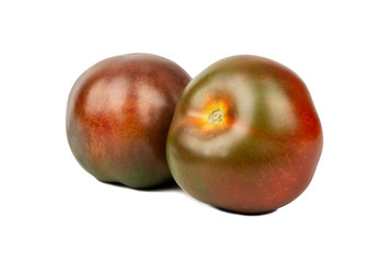 Fototapeta na wymiar Two kumato tomatoes