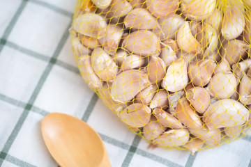 Garlic in yellow net