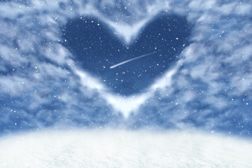 Fototapeta na wymiar Christmas winter background with clouds in heart frame. Happy and love background.