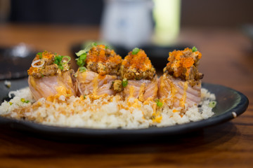 Close up of grill salmon roll sushi