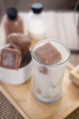 Ice fresh milk in a glass with ice cubes chocolate