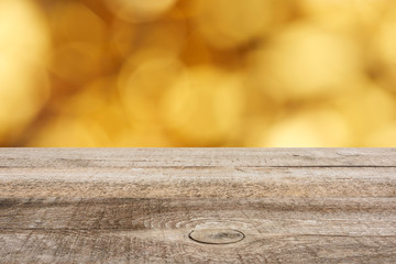 template of brown wooden floor and blurred golden background