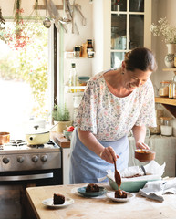 Baker making brownies with salted caramel